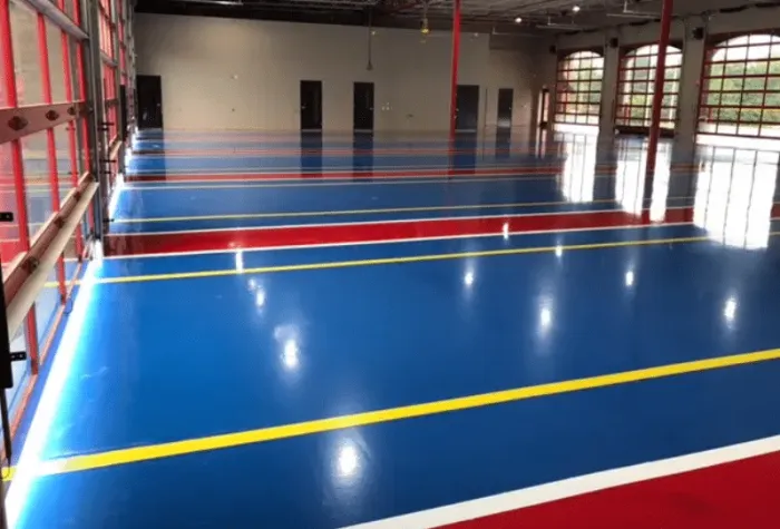Blue and red coated sports floor in a gym