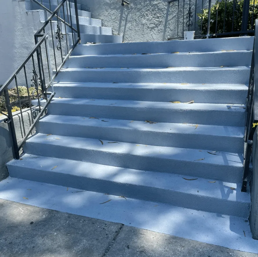 Coated concrete stairway