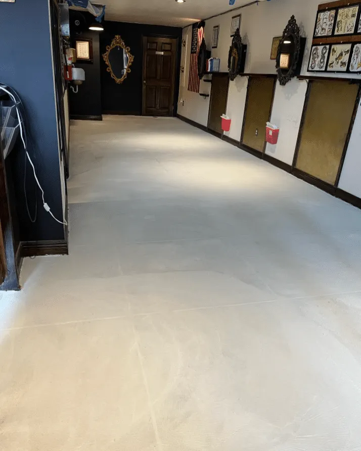 Light coated floor in a long corridor