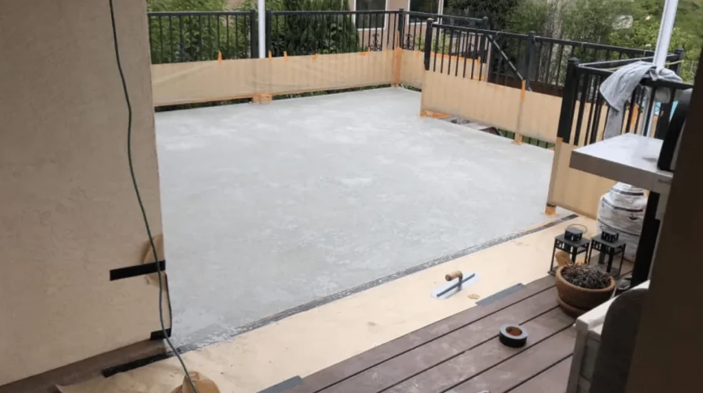 Light coated patio deck with a wood edge