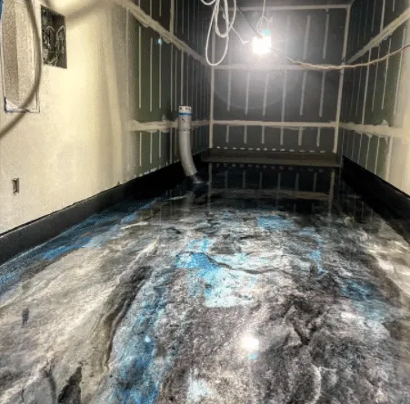 Marbled metallic epoxy floor in a utility room
