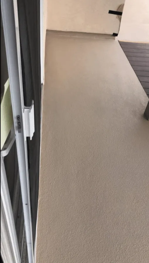 Light-colored finished basement floor
