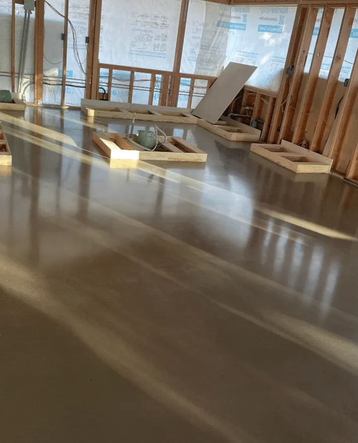 Freshly polished concrete floor reflecting window light